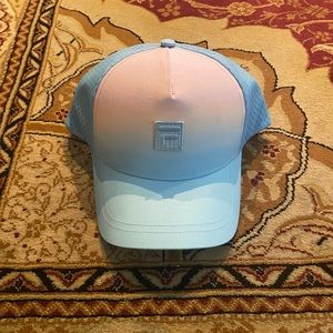 Blue and white FILA hat